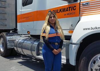 While other girls played, she dreamed of driving a giant