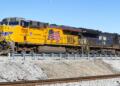 UP-NS improve merger proposal; US authority calls for release of jobs data